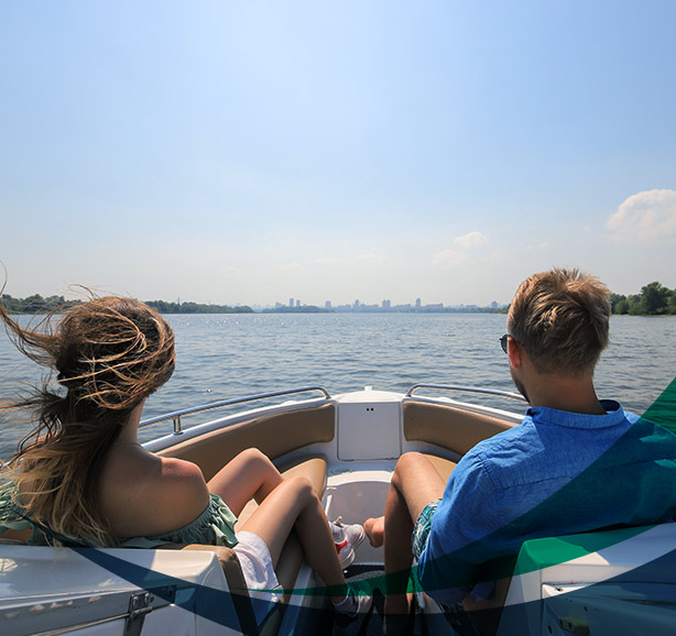 a-couple-sitting-on-front-seats-of-a-boat-dartmouth-ma